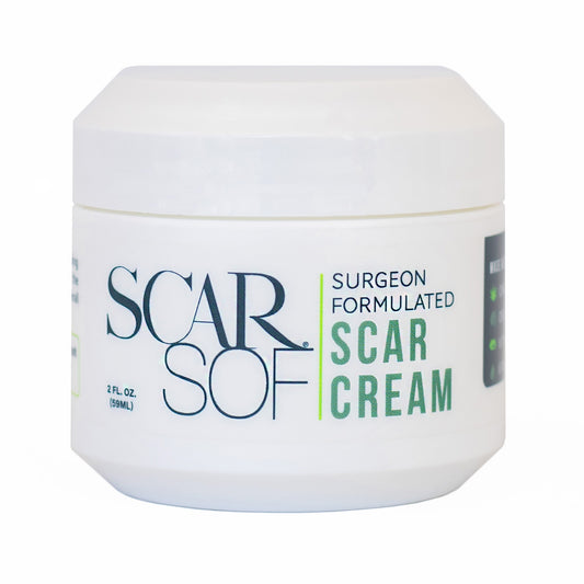 Close up the ScarSoft Surgeon Formulated Scar Cream.  Cream helps reduce the apperance of scars such as ones caused by surgery, burns, injuries, and stretch marks.  Produced by a woman owned company.
